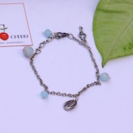 Silver Bracelet with Blue Beads & Charms
